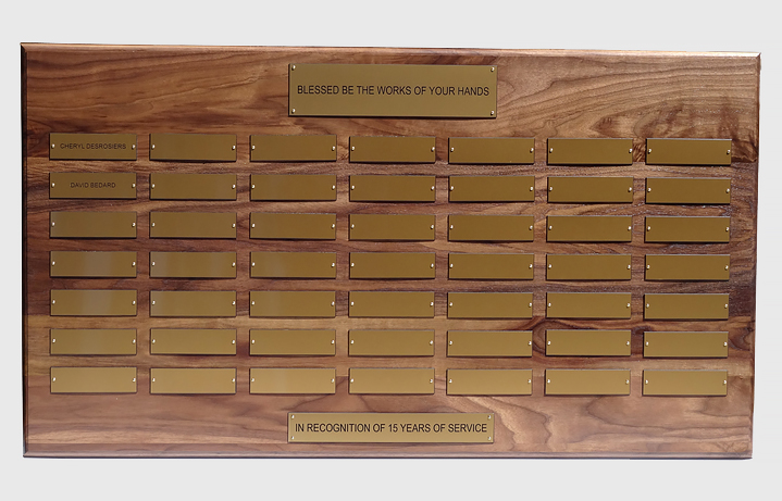 2 foot x 3 foot 7 in. custom solid walnut perpetual plaque with 49 gold plastic plates & beveled edges