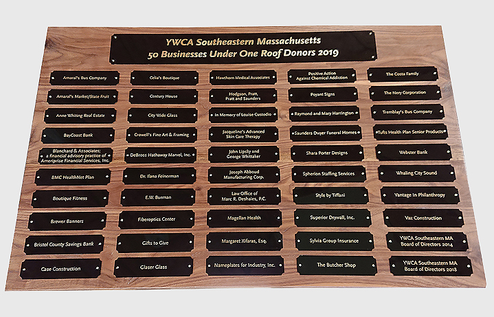 2 Foot x 3 foot custom walnut perpetual donor plaque with 50 black brass plates measuring 1.5 in x 6 in