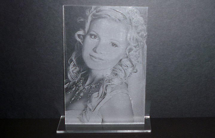 Photo engraving on clear acrylic and displayed with a black backdrop