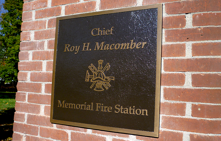 24 in. x 24 in. Bronze memorial plaque with raised letters & symbol, dark oxide stain, leatherette background & concealed studs