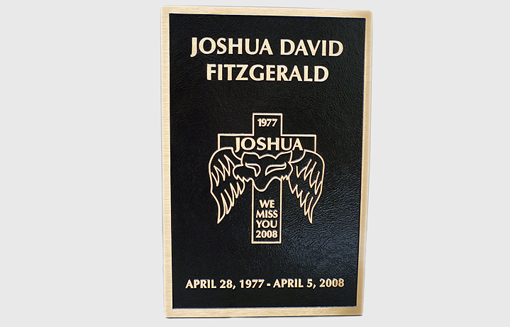 12 in. x 18 in. Bronze memorial plaque with raised letters & artwork, dark oxide stain, leatherette background & concealed studs