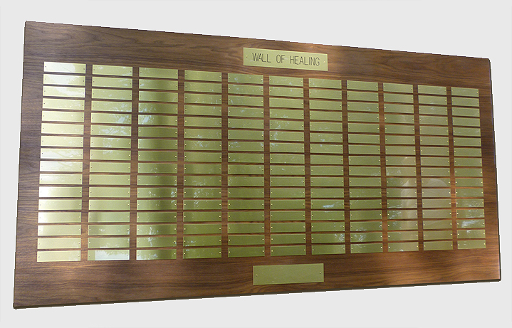 7 foot x 3 1/2 foot custom walnut perpetual plaque with 176 brass plates