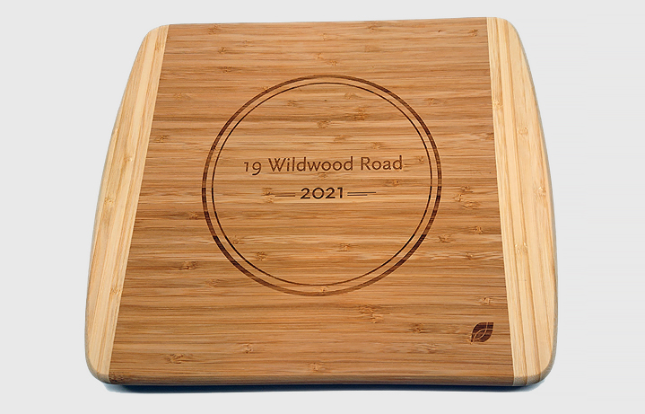 Personalized two-tone bamboo cutting board promo product